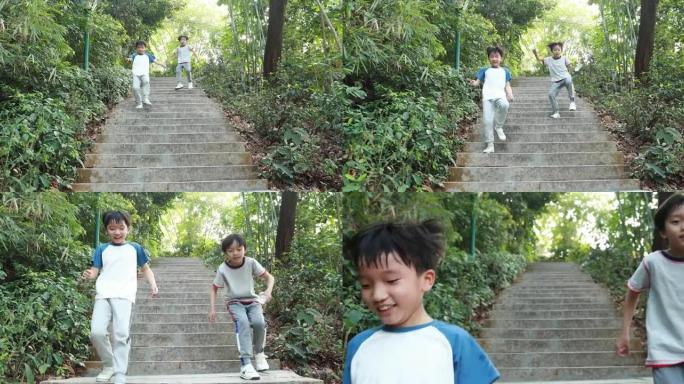 小男孩在公园里跑步