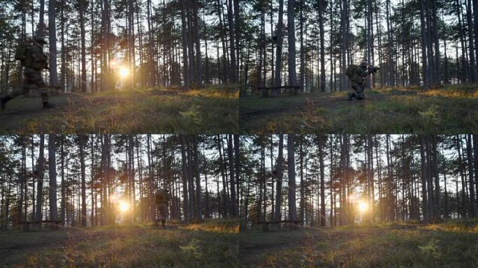在阳光明媚的傍晚，身穿迷彩服的士兵在树林中奔跑，跪着瞄准射击武器，在执行任务或进行空中反恐训练时逃跑