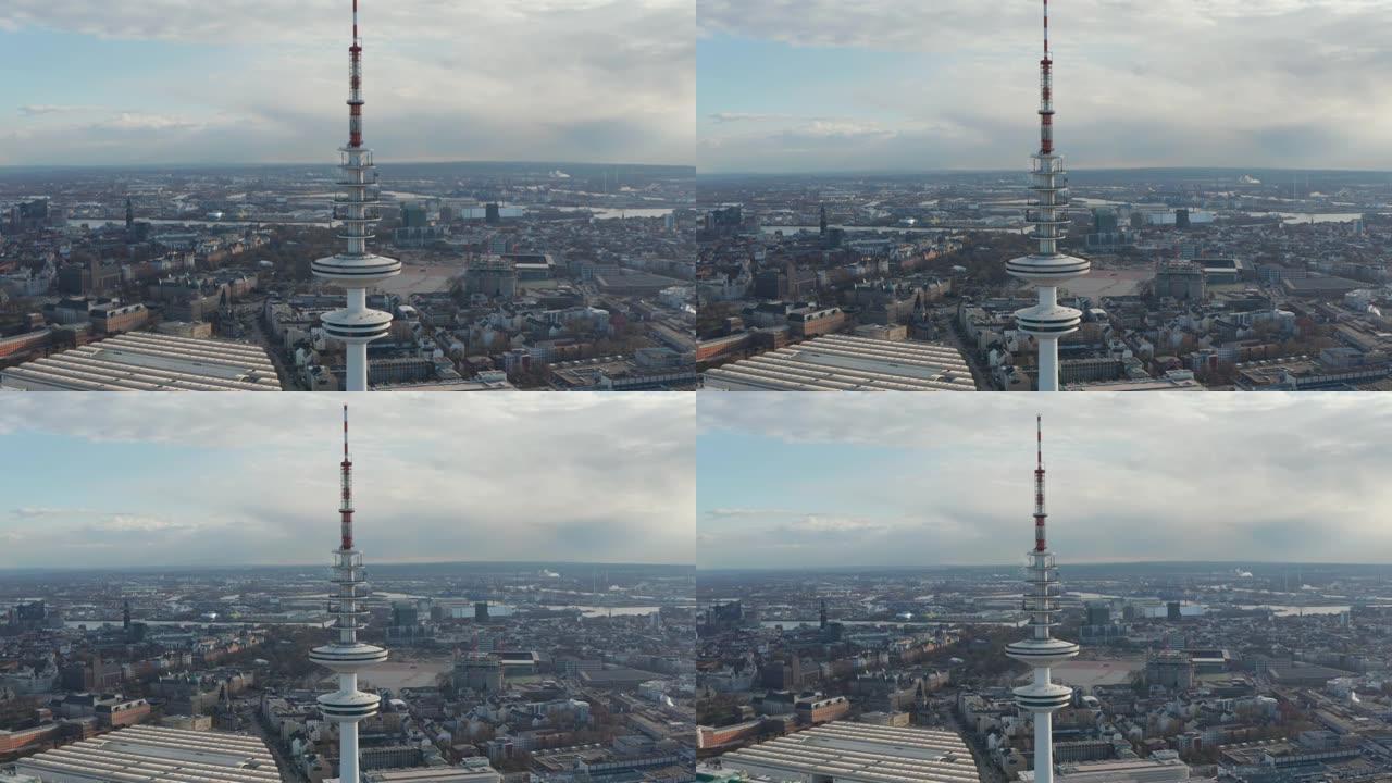 高高的白色海因里希·赫兹电视塔在汉堡城市景观上方的空中手推车视野