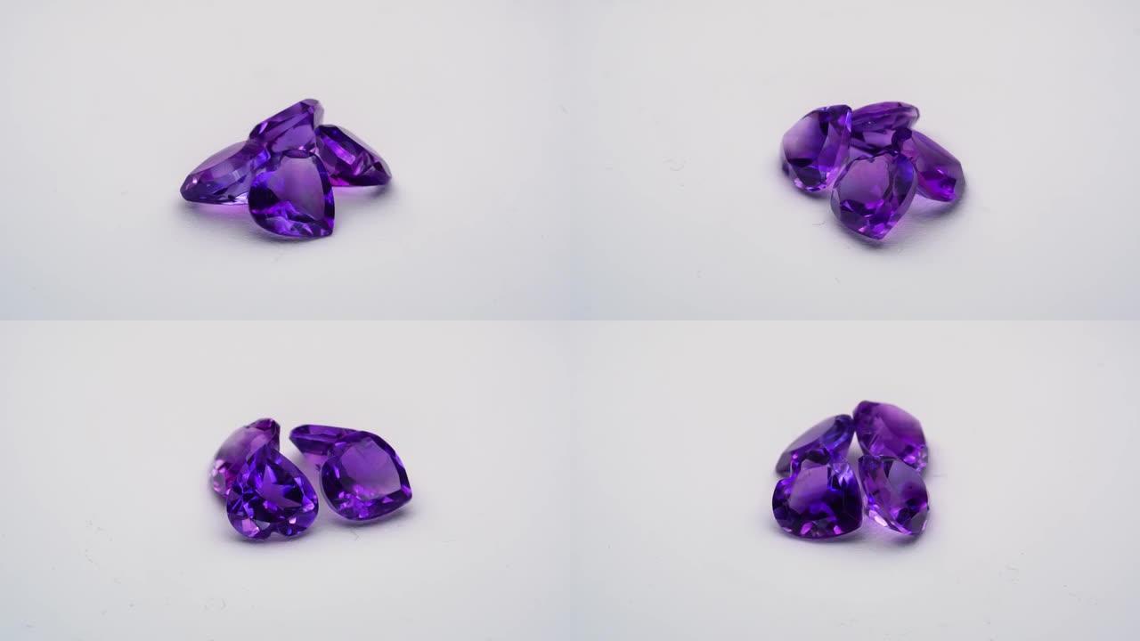 天然紫水晶在白色背景上旋转