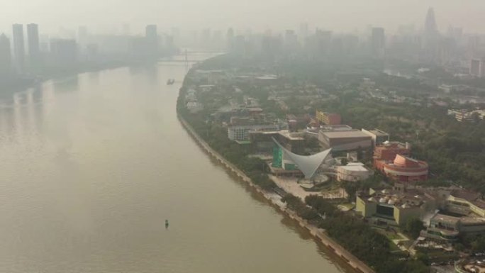 阳光明媚的夜晚广州市滨江美术馆航空全景4k中国