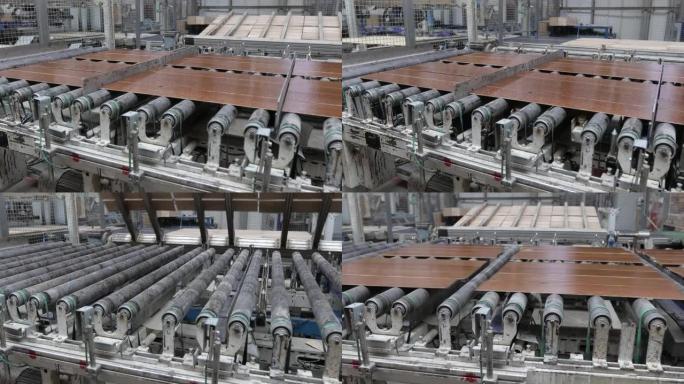木工厂。拼花板生产线。现代层压地板工业工厂。