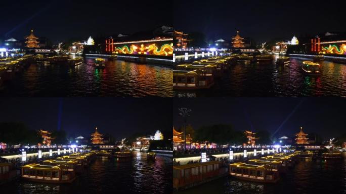 夜间照明南京市著名老城区河流旅游船码头前全景4k中国