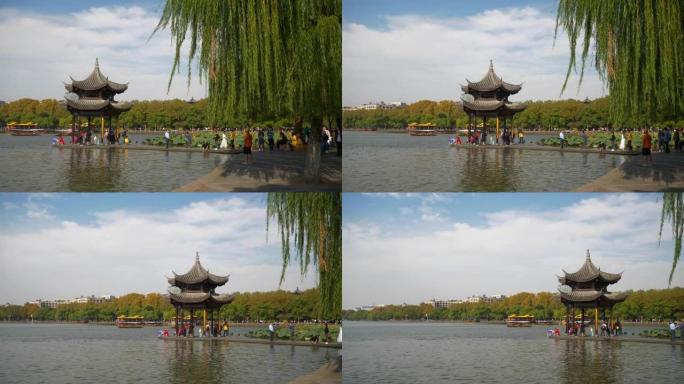 杭州市晴天著名西湖湾拥挤桥湾宝塔慢动作全景4k中国