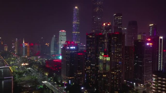 夜间照明广州市现代市中心滨河交通湾空中全景4k中国
