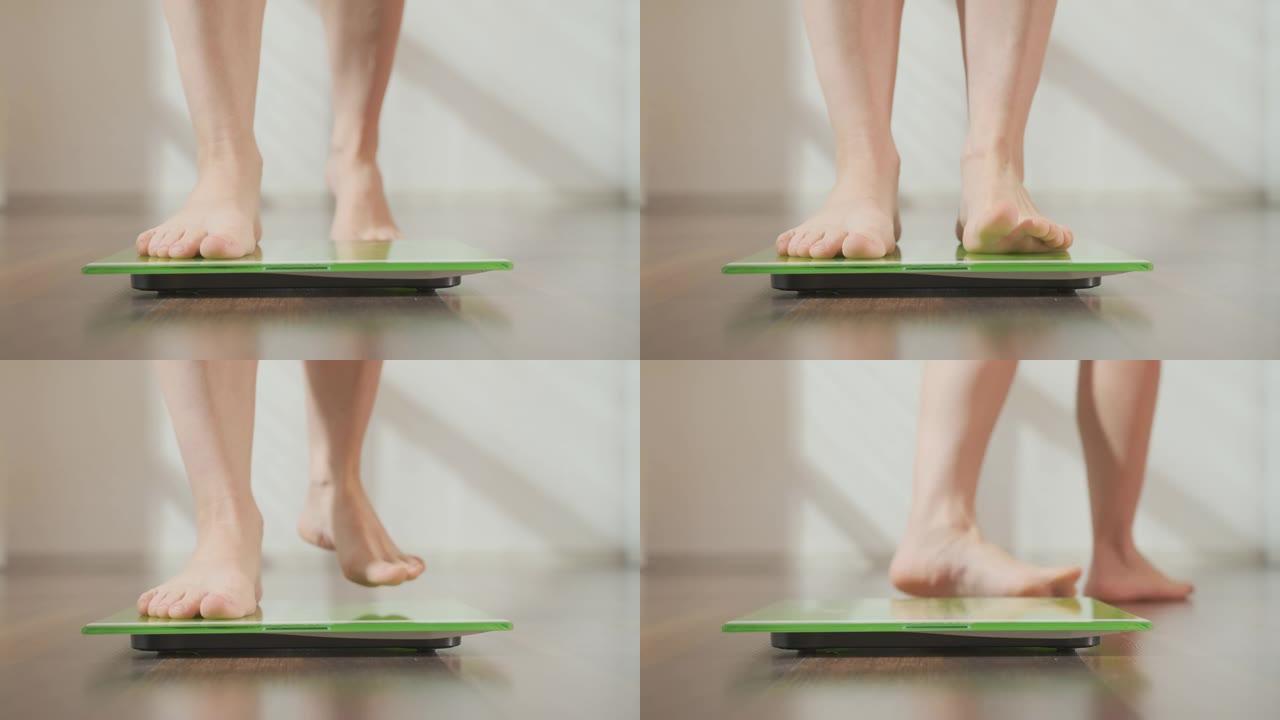 女人检查体重。女性脚在地板上测量秤