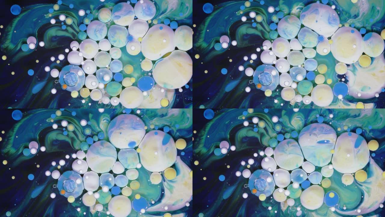 蓝色，白色，蓝绿色的气泡在蓝色的背景。液体抽象。