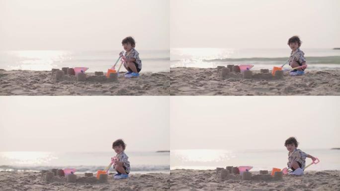 海滩上可爱的男孩海边沙滩创造力童年时光