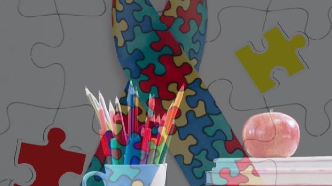 拼图的动画落在由拼图，彩色铅笔和书堆形成的丝带上