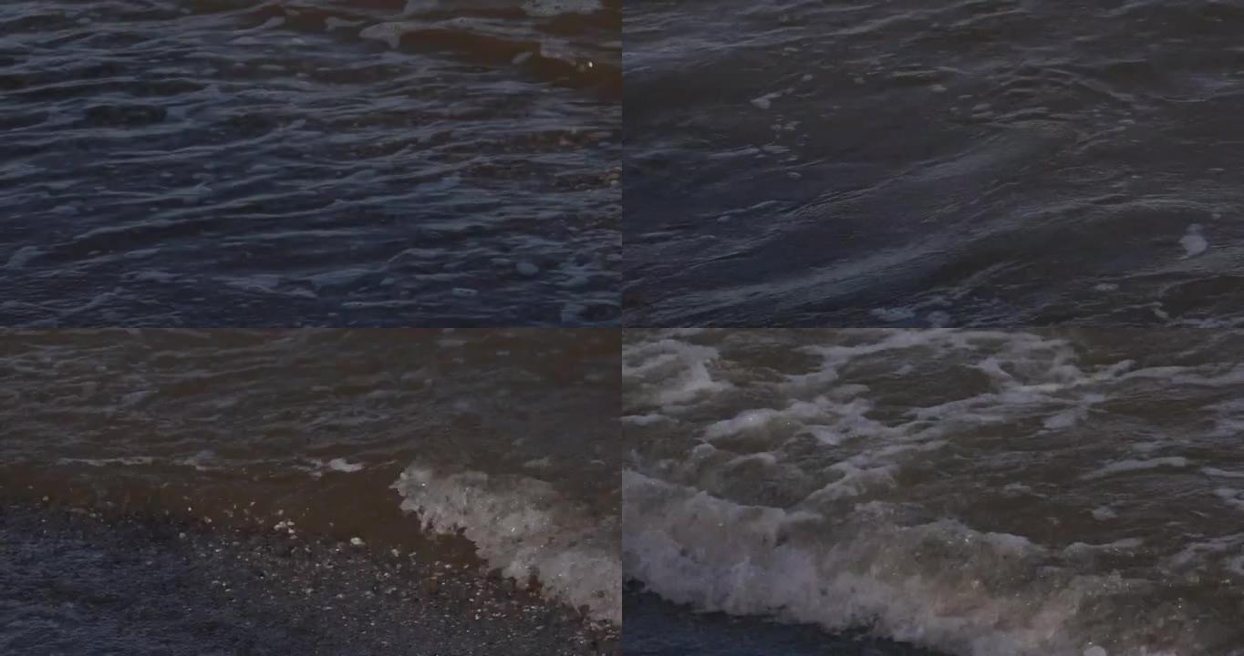 日落前沙滩上的海浪，