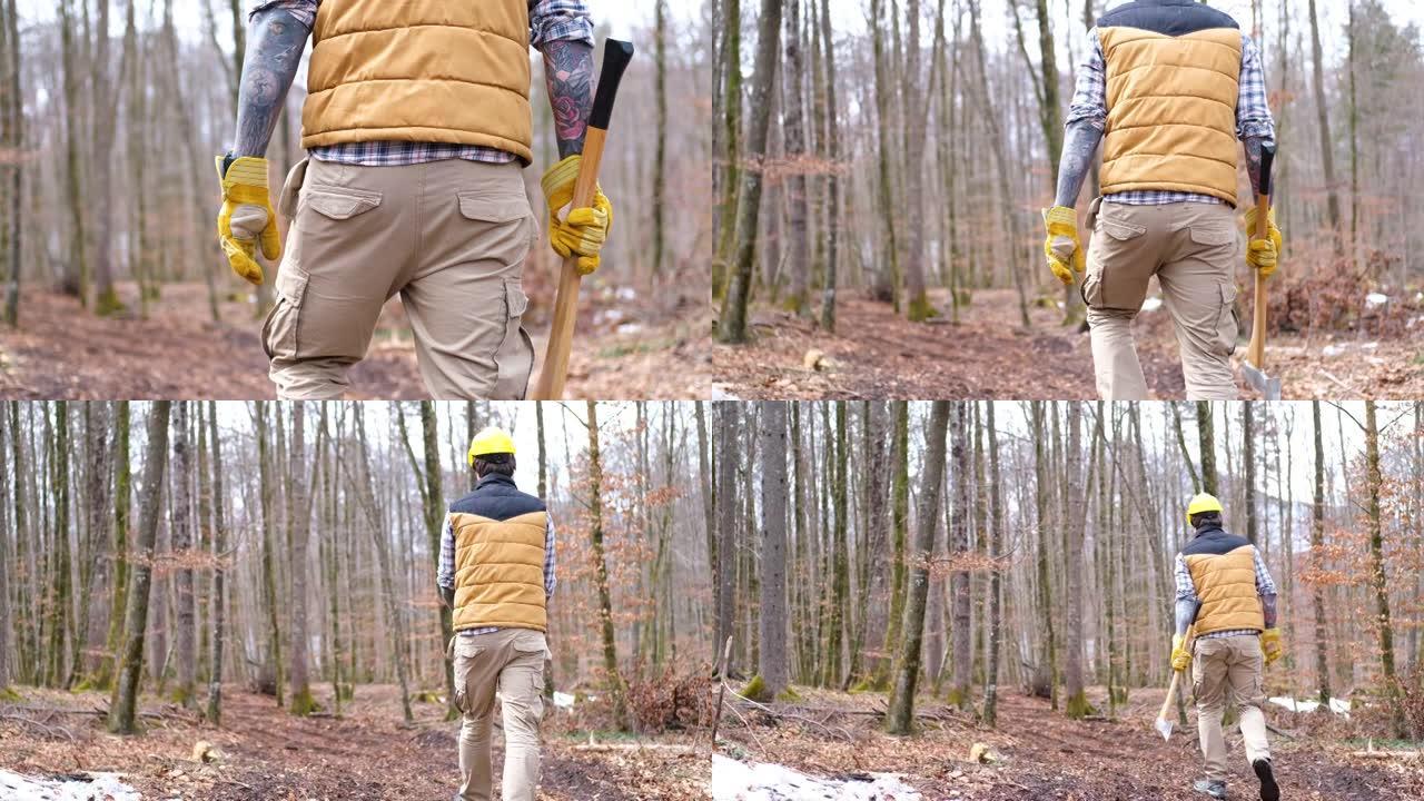 拿着斧头的人从相机里走到森林里。