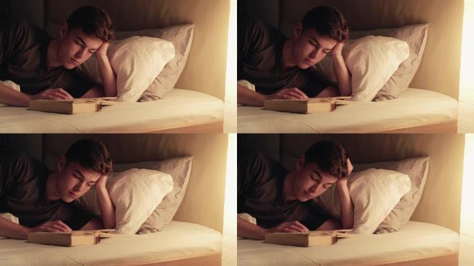 深夜阅读爱好放松的家伙预订舒适的床