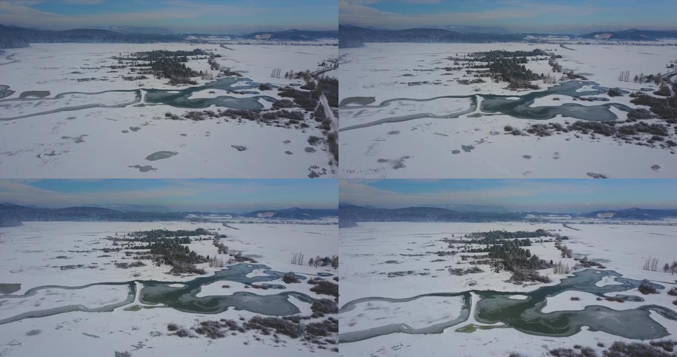 春季冰漂在冰冻的冬季河湖飞越-无人机收藏股票视频