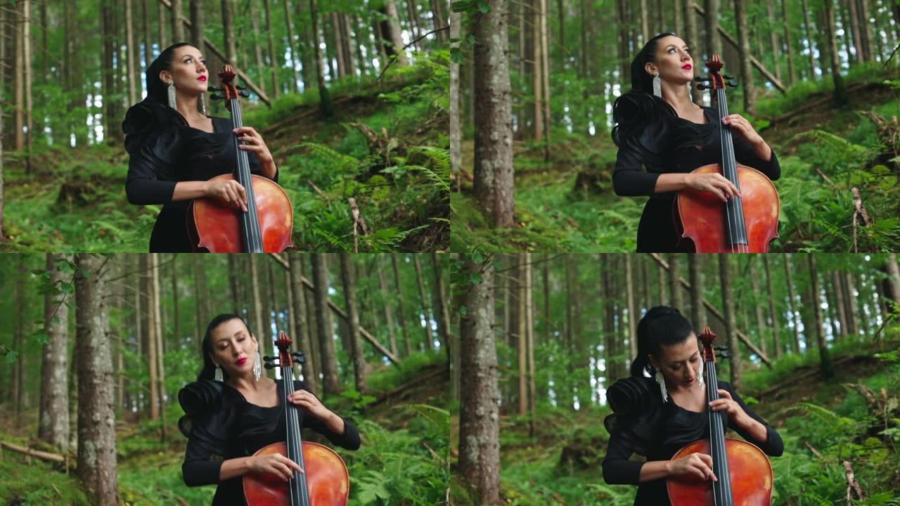 森林里美丽的大提琴手。穿着黑色连衣裙的奢华女人在绿色自然背景下演奏大提琴。迷人的女音乐家在户外表演音