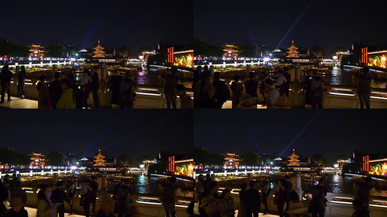 夜间照明南京市著名古城河旅游船坞拥挤桥全景4k中国