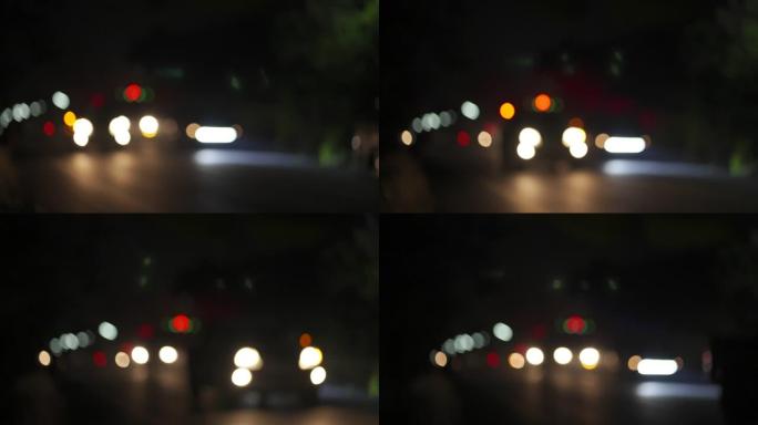 夜间救助灯背景模糊，汽车交通对道路事故的概念