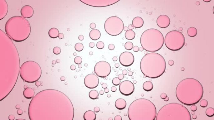 粉色不同大小的透明气泡缓慢自发移动