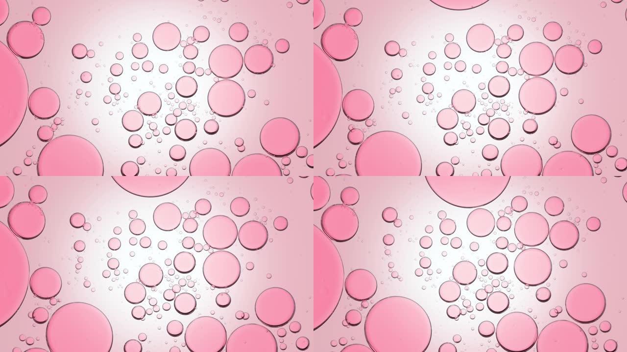 粉色不同大小的透明气泡缓慢自发移动