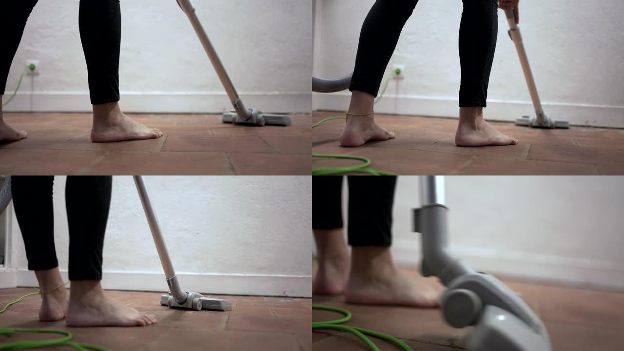 用吸尘器打扫家庭的人，女人打扫肮脏的地板角落