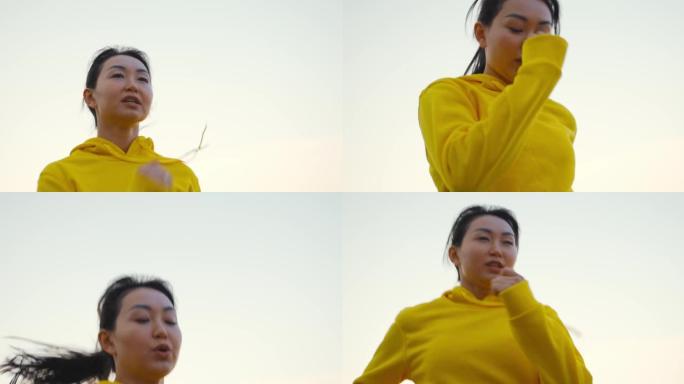 在公园里跑步的年轻女子。健身