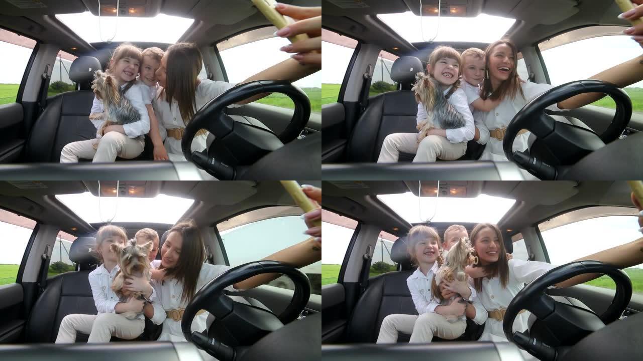 暑假期间在汽车上的家庭自拍照片