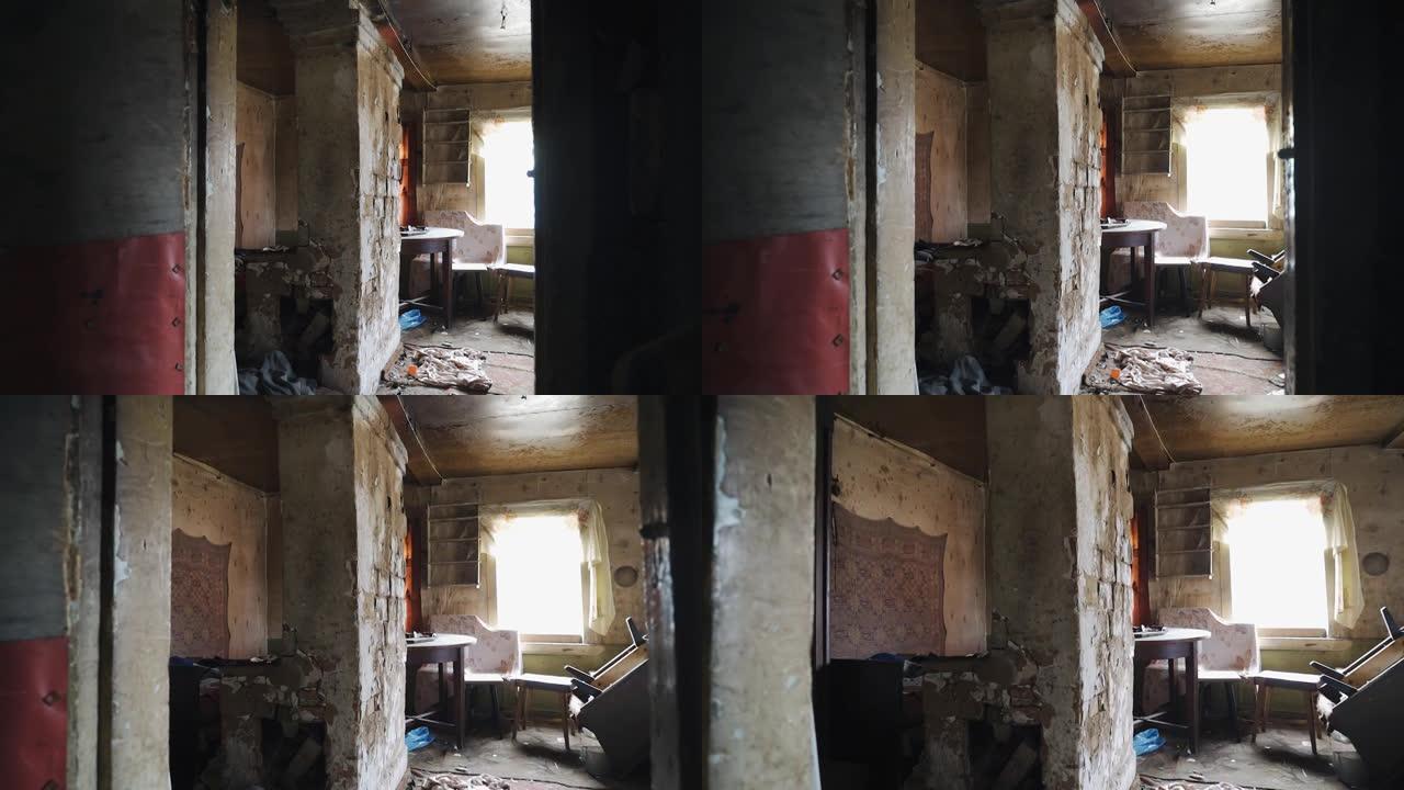 在一间废弃的房子里开枪，房子里有旧的脏家具和破旧的墙壁。荒凉的气氛。摄像机在运动中拍摄