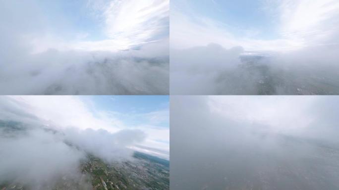 FPV无人机正在云中高速飞行。冲浪云彩，跳伞的概念。