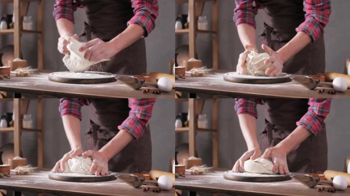 面包师为自制面包烹饪制作面团和面包店配料