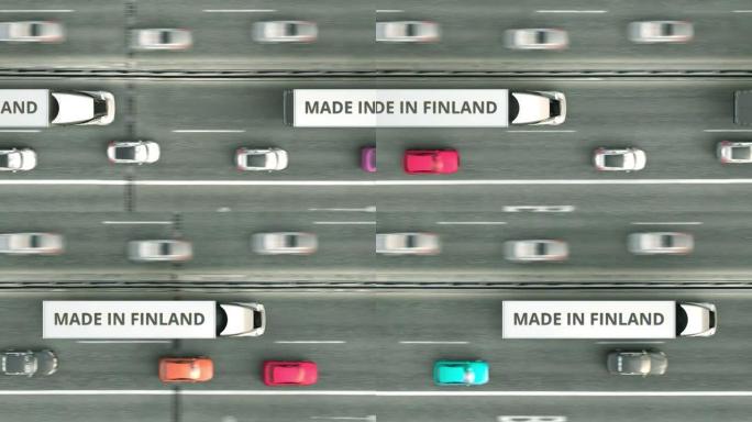 拖车的空中俯视图，芬兰制造文本沿着道路行驶。芬兰商业相关可循环3D动画