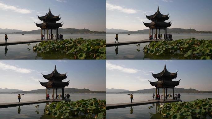晴天时间杭州市著名的西湖码头宝塔慢动作全景4k中国