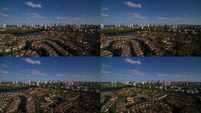 佛罗里达州迈阿密的阿文图拉、黄金海滩和阳光岛的空中超宽全景。无人机制作的夹子，带有平移相机运动。