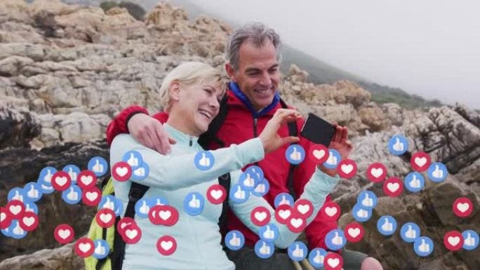 自然界中的高级夫妇用智能手机自拍的数字爱情和偶像动画