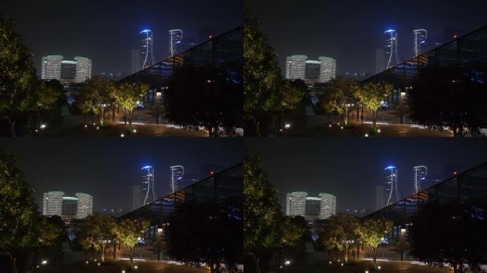杭州市区夜间照明著名现代建筑广场顶部全景4k中国