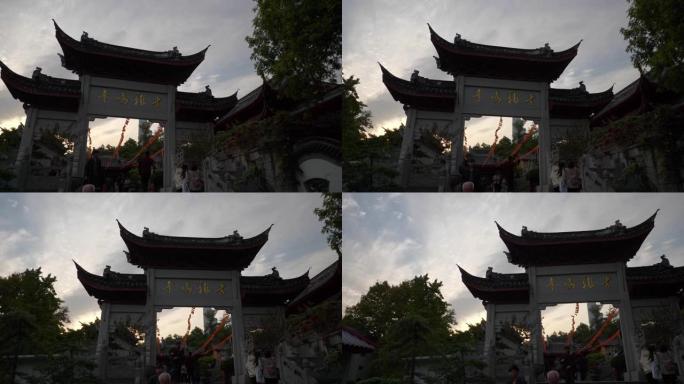 日落时间南京市最高建筑拥挤庙门景观慢动作全景4k中国