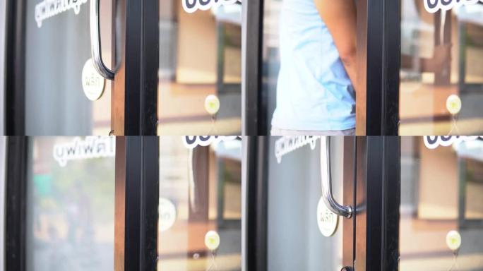 男子开门店咖啡特写