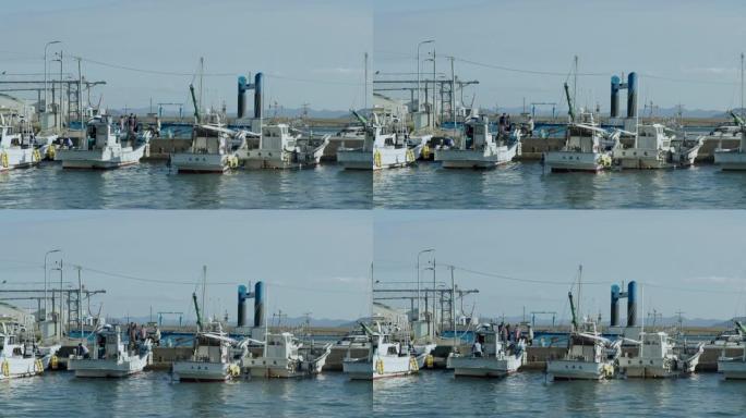 渔业景观。停靠在港口的渔船。