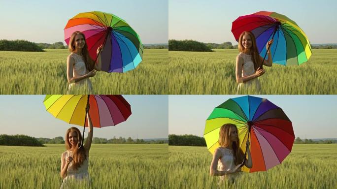 日落时分，田野里有五彩雨伞的女孩
