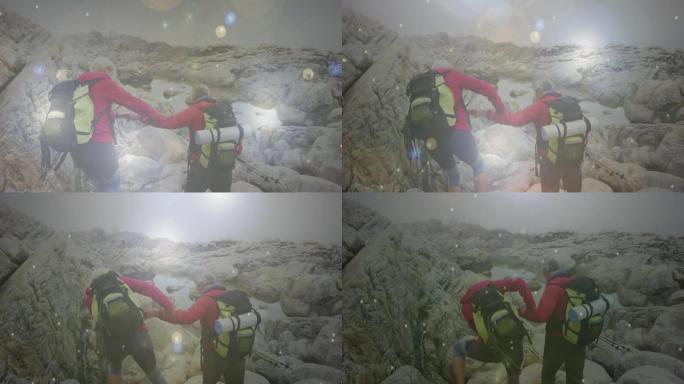 快乐的高加索高级夫妇在山上徒步旅行，穿越快速移动的雪花