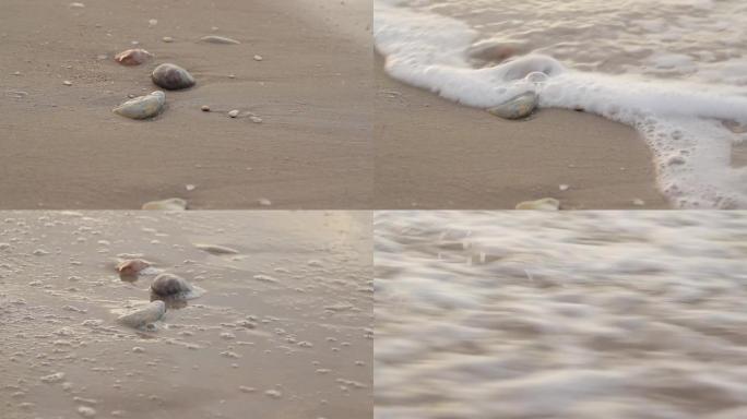 日落时，海浪在岸边的鹅卵石上滚动。亚得里亚海海岸。特写
