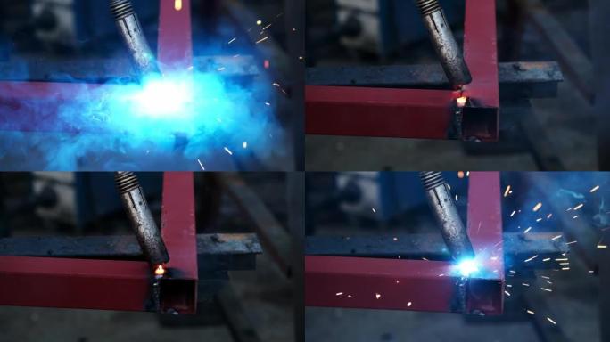 使用焊接机的金属钢和铁的特写铁匠，在极端慢动作中发出明亮的火花和闪光