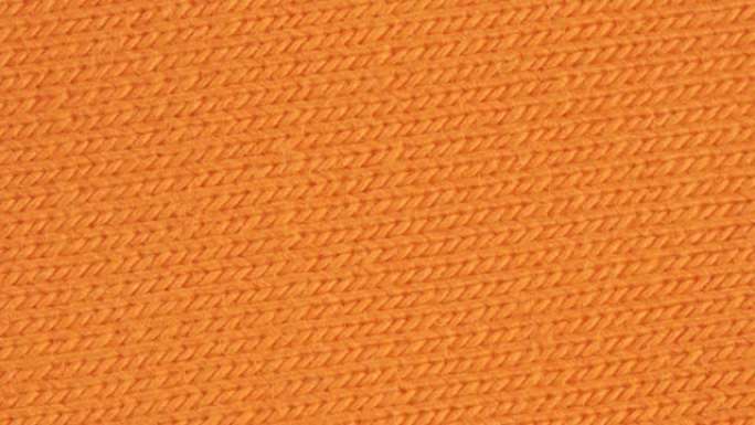 纺织背景-橙色棉弹性纤维 (bubber，lycra) 弹性织物