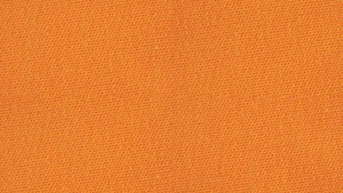 纺织背景-橙色棉弹性纤维 (bubber，lycra) 弹性织物