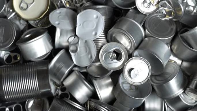 大量用于回收的金属罐、罐和广口瓶。铝金属食品和饮料分类残渣。钢包装。零垃圾和家庭垃圾回收概念。没有污