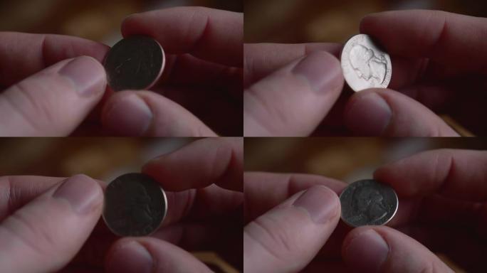 硬币在掷硬币中被人的手在空中翻转20