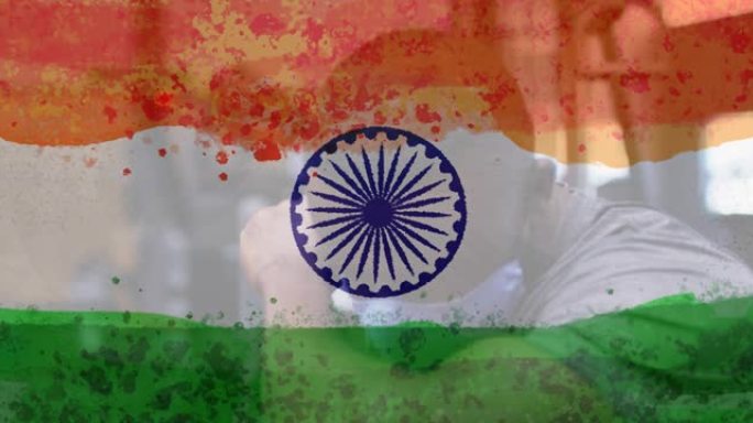 在印度国旗上戴着口罩的男子的组成
