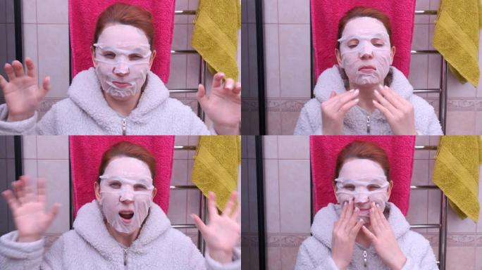 脸上戴着化妆品面膜的女人害怕自己。脸上戴着面具很有趣。