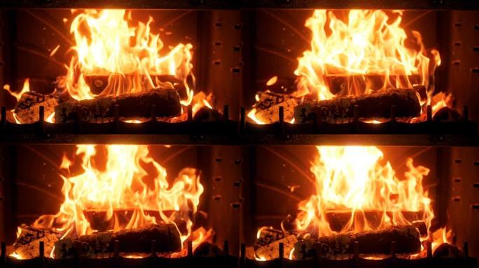 壁炉中燃烧木原木的慢动作视频。缓慢的火焰和上升的烟雾