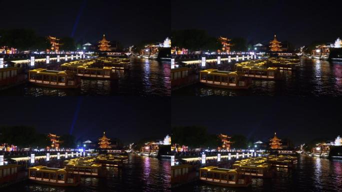 夜间照明南京市著名老城区河流游客拥挤船坞广场全景4k中国