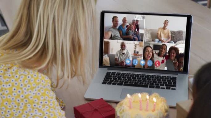 高加索母女在家笔记本电脑上的视频会议上庆祝生日