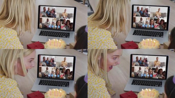 高加索母女在家笔记本电脑上的视频会议上庆祝生日